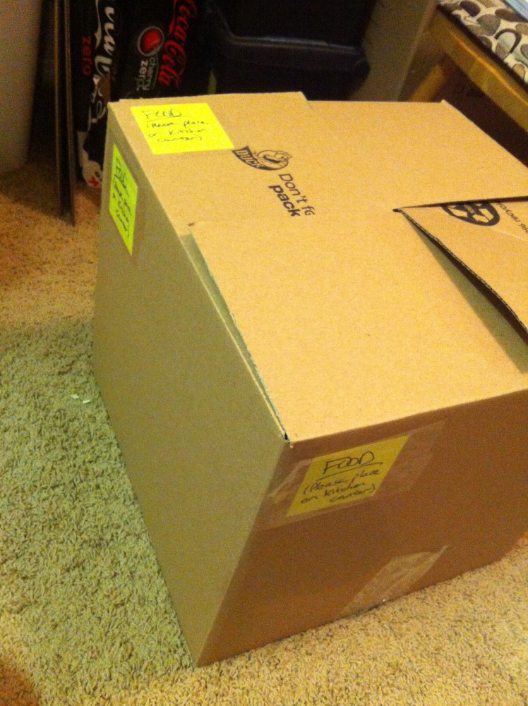 The wrong way to close box tops.